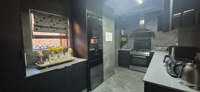 For Sale: Spacious 4-Bedroom Townhouse in Benoni Central with ample parking and staff quarters.