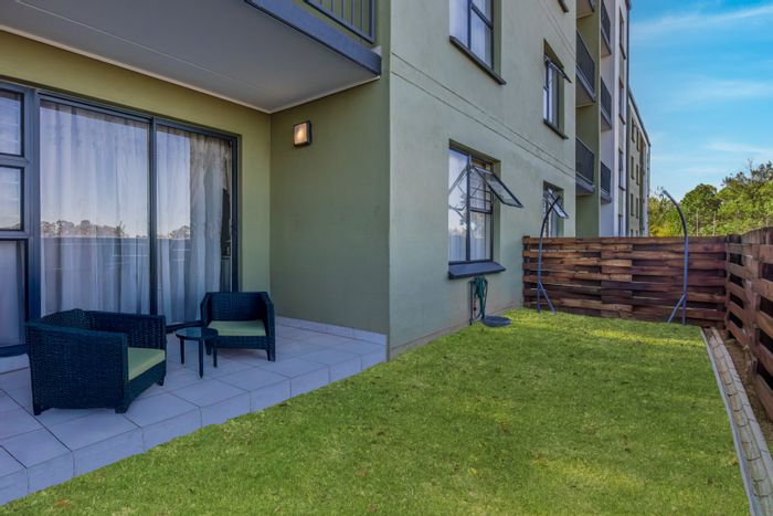 For Sale: Townhouse in Comet with gourmet kitchen, fitness center, and private balcony.