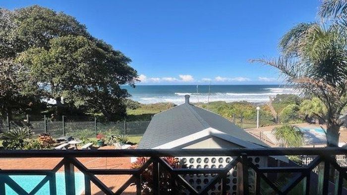 Beachfront apartment in Shelly Beach for sale with pool and direct beach access.