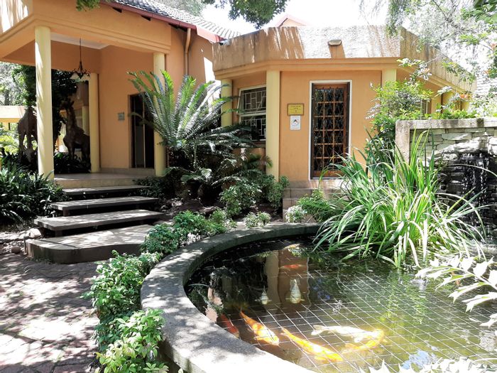 Clubview House For Sale: Guest house, conference facilities, pools, and expansive parking.