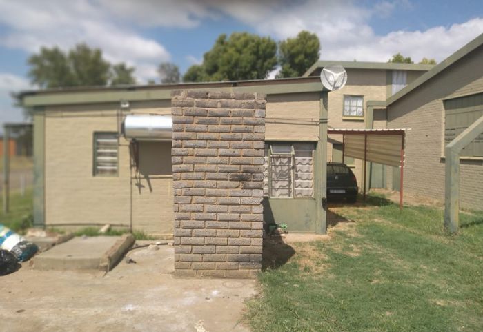 For Sale: House in Bothaville Industrial with large warehouse, office, and flat.