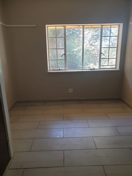 2 Bedroom Apartment For Sale in Stilfontein Ext 1 with carport and easy access.