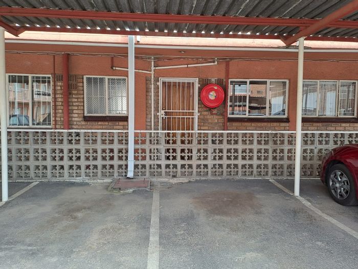 Ground floor 2-bedroom apartment in Benoni Central, for sale with ample storage.