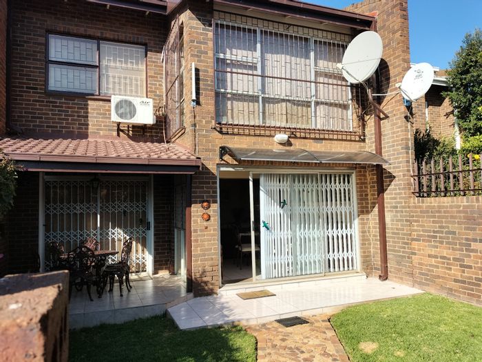 For Sale: 3 Bedroom Townhouse in Stilfontein Central with garage, carport, and security.