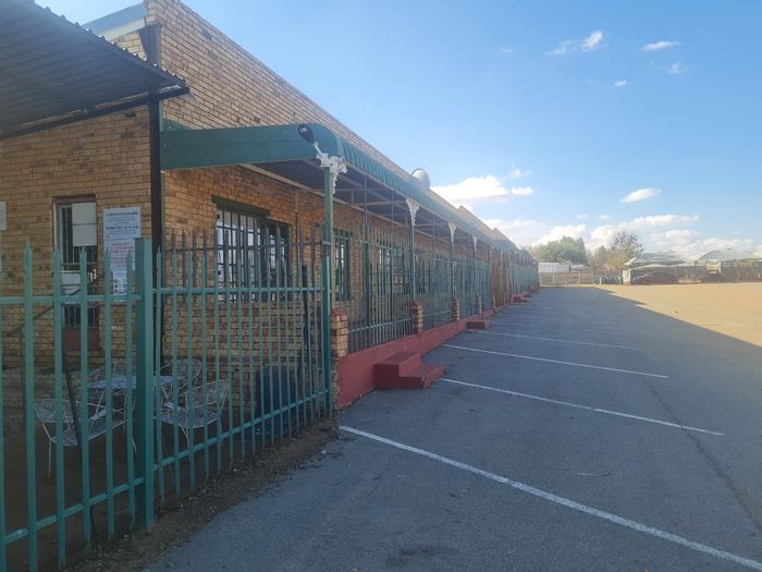 For Sale: Retail property in Wilkeville with rental apartments and ample parking.