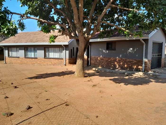 For Sale: Spacious 3-bedroom house in Soshanguve Ext with garage and yard.