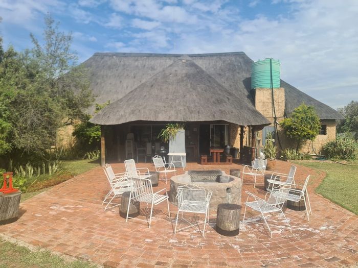 For Sale: Farm in Dinokeng Game Reserve with lodge, pool, and wildlife access.