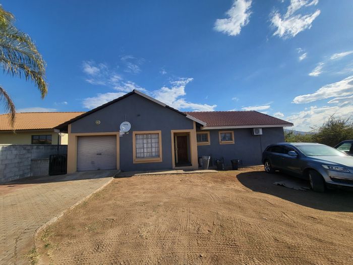 Three-bedroom house in Burgersfort Central for sale, featuring open-plan living and garage.