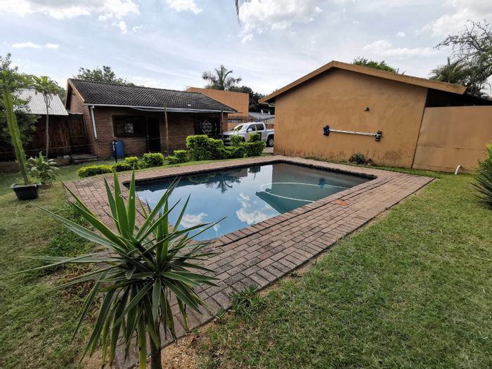 For Sale: West Acres House with 4 bedrooms, pool, braai area, and wendy house.