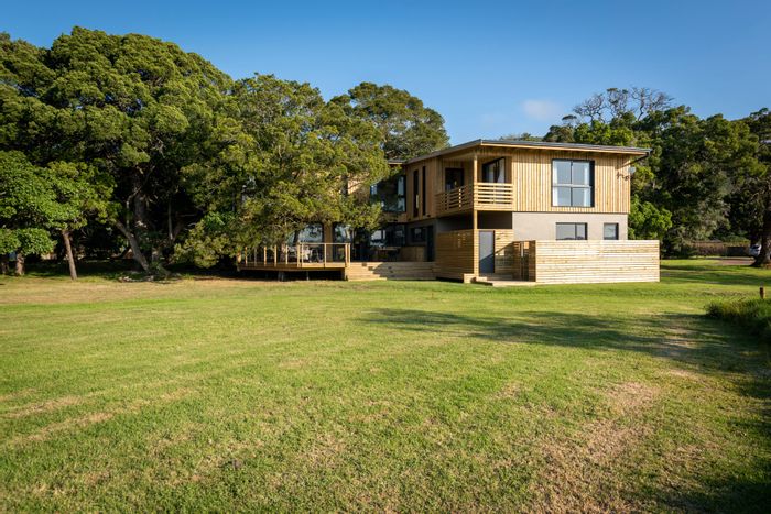 For Sale: House in Brenton On Lake with innovative timber design and serene lagoon views.