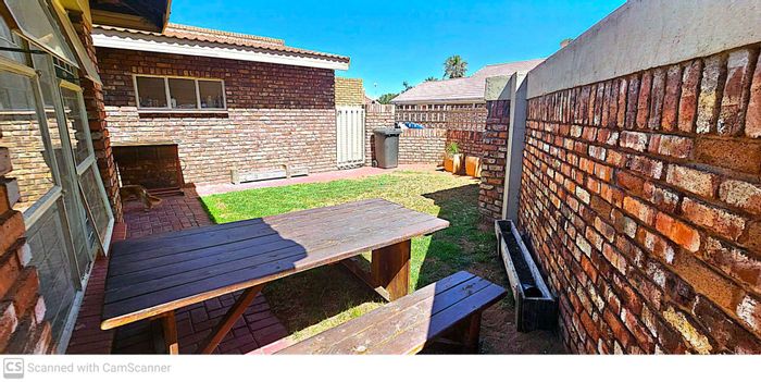 Upgraded 3-bedroom townhouse in Camelot, close to town, low maintenance yard. For Sale.