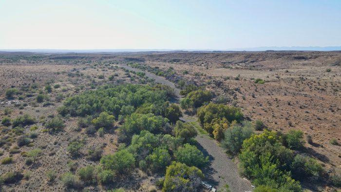 Farm for Sale in Leeu Gamka: 3-bed house, solar power, extensive water resources.