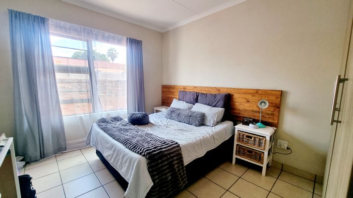 For Sale: Townhouse in Potchefstroom Central with secure complex, garage, and braai area.