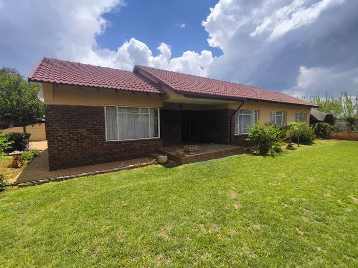 3 Bedroom house for sale in Stilfontein Ext 4 with garage, lapa, and amenities.