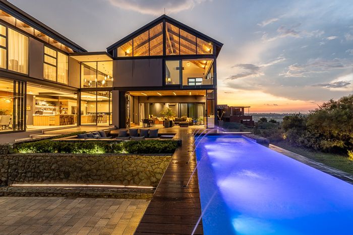 For Sale: House in The Hills Game Reserve Estate with pool, cinema, and garages.