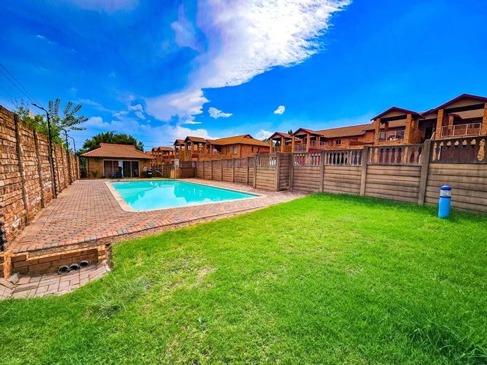 For Sale: Clubview Apartment with 2 Bedrooms, Pool, Garage, and Braai Area.