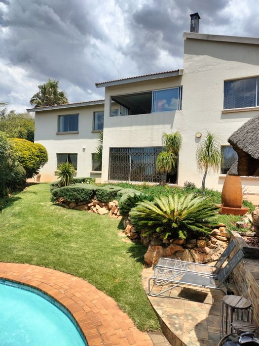 For Sale: Noordheuwel House with pool, flatlet, gym, and entertainment areas.