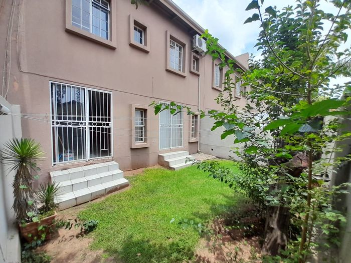 For Sale: Apartment in Corlett Gardens with private garden and guest toilet.