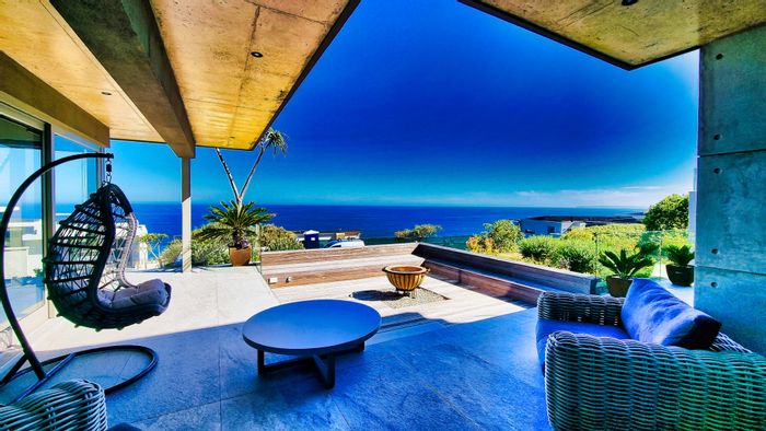 Oubaai House For Sale: Ocean views, multiple fireplaces, solar panels, and spacious living.