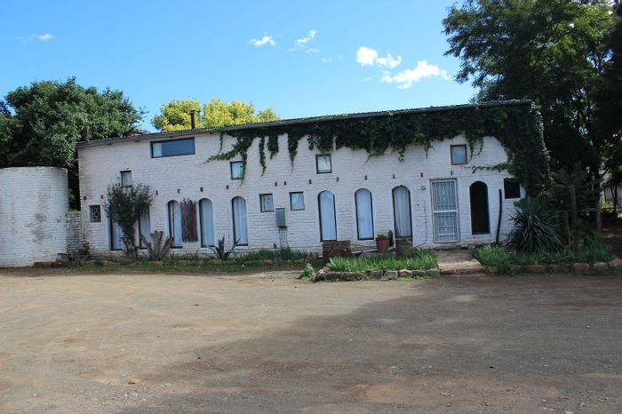For Sale: Unique Nieu Bethesda house with duplex, cottage, workshop, and garden.