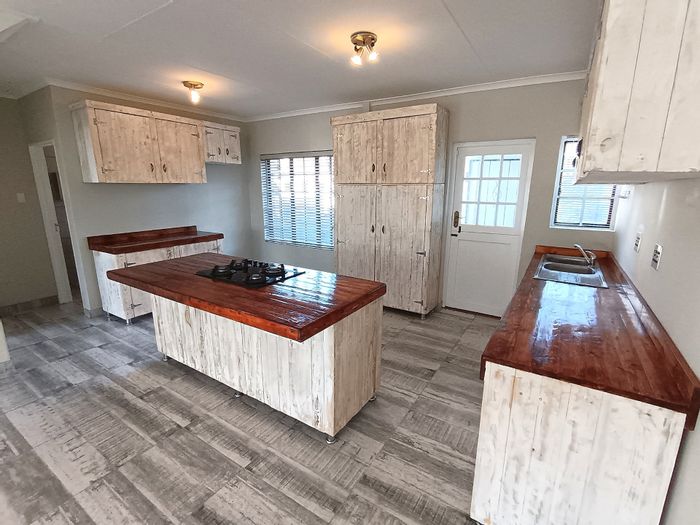 Corner Townhouse in Lorraine For Sale: Smart home, solar system, and garden braai.