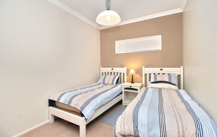 For Sale: Strand Central Apartment with Beach Access, Furnished, Cash Only, No Transfer Duty.