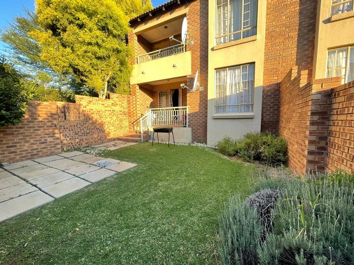 Mooikloof Ridge Apartment For Sale: Ground floor, private patio, community amenities included.