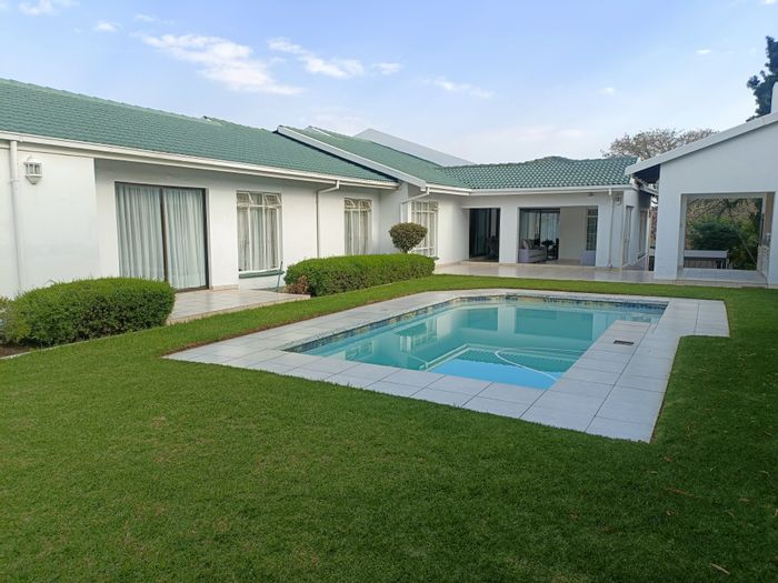 Stylish 4-Bed Zwartkop House with Entertainment Area, Pool, and Ample Parking - For Sale