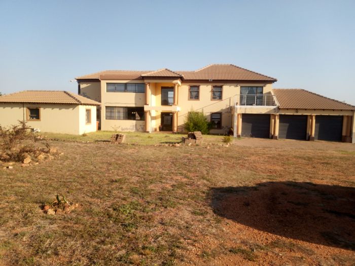 Expansive Rietvlei View House with Flatlet, Garages, and Scenic Patios For Sale