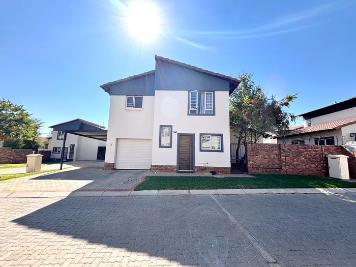 For Sale: Townhouse in Oukraal Estate with garden, garage, and security features.