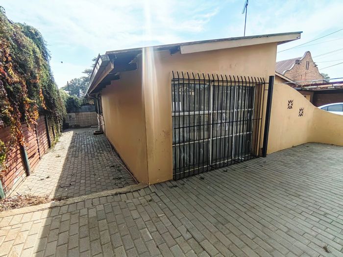 Investment House for Sale in Pretoria West with Multiple Rental Units and Amenities.