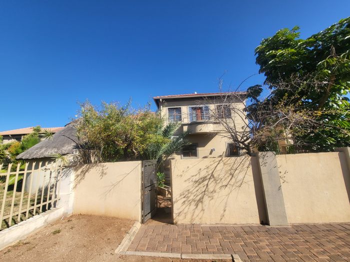 House for Sale in Burgersfort Central: Spacious, open-plan living, three bedrooms, two garages.