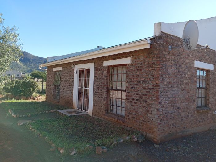 For Sale: 2-bedroom house in Spandauville with carport, water tank, and expansion potential.