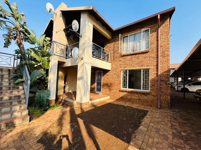 Ground floor apartment in Highveld for sale, includes pool, braai, and carport.