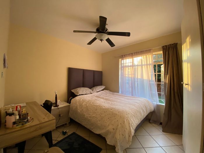 2 Bedroom Apartment For Sale in Mooikloof Ridge with garden, garage, and amenities.
