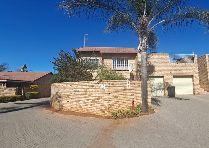 Highveld Townhouse For Sale: 2-bed, garage, braai area, near amenities.