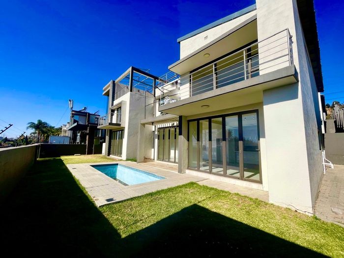 For Sale: Cluster in Bedfordview Central with rooftop entertainment, pool, and staff accommodation.