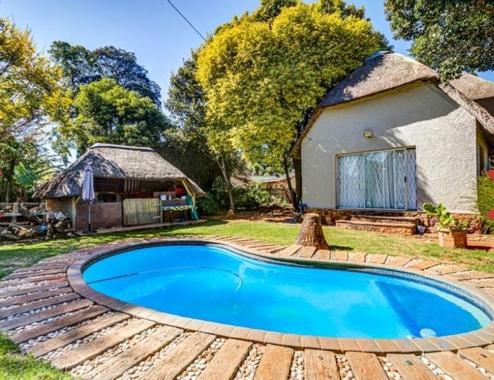 Spacious Glen Marais house for sale with pool, lapa, and ample parking.