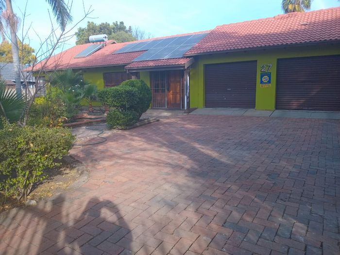 For Sale: Spacious 4-Bedroom House in Karenpark with Garden, Lapa, and Solar Panels.