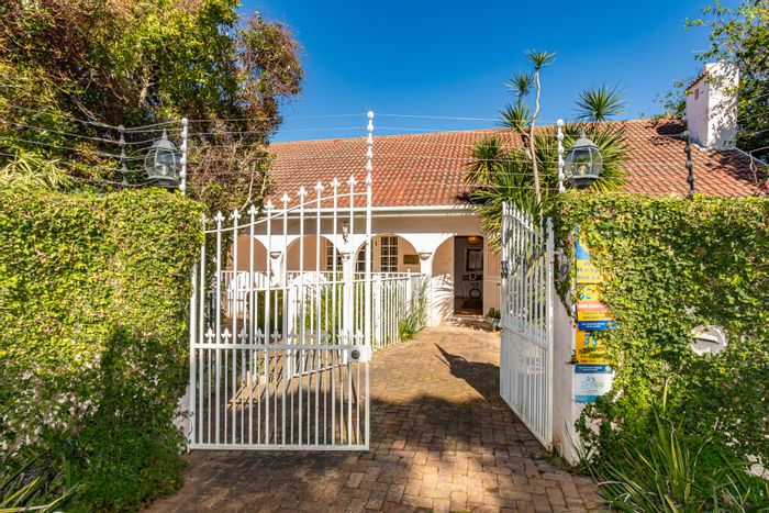 For Sale: Spacious Constantia house with 4 bedrooms, pool, and entertainment patio.