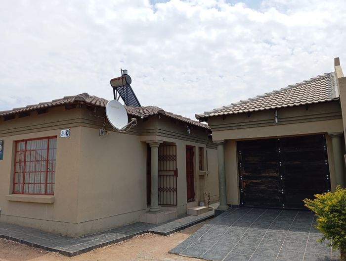 For Sale: House in Rethabile Gardens with 3 bedrooms, garage, and secure fencing.