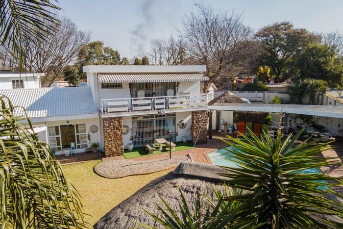 Wychwood House For Sale: Pool, staff quarters, spacious lounge, and ample parking.