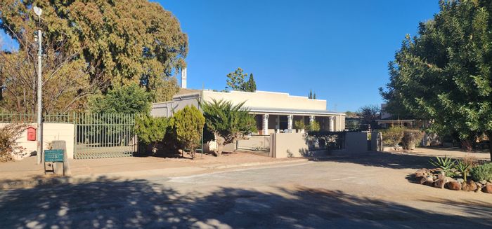 For Sale: Middedorp House with Established Garden & Guesthouse Potential