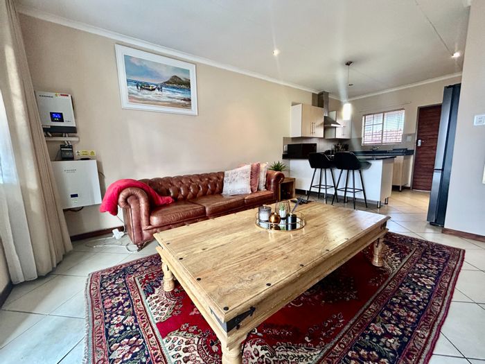 Townhouse for Sale in Mooikloof Ridge: 3 Bedrooms, Private Garden, Secure Living!