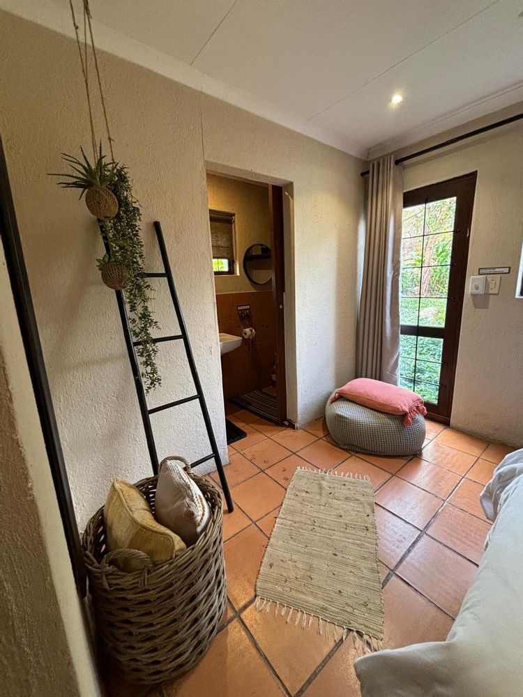 Cottage bedroom with an on-suite