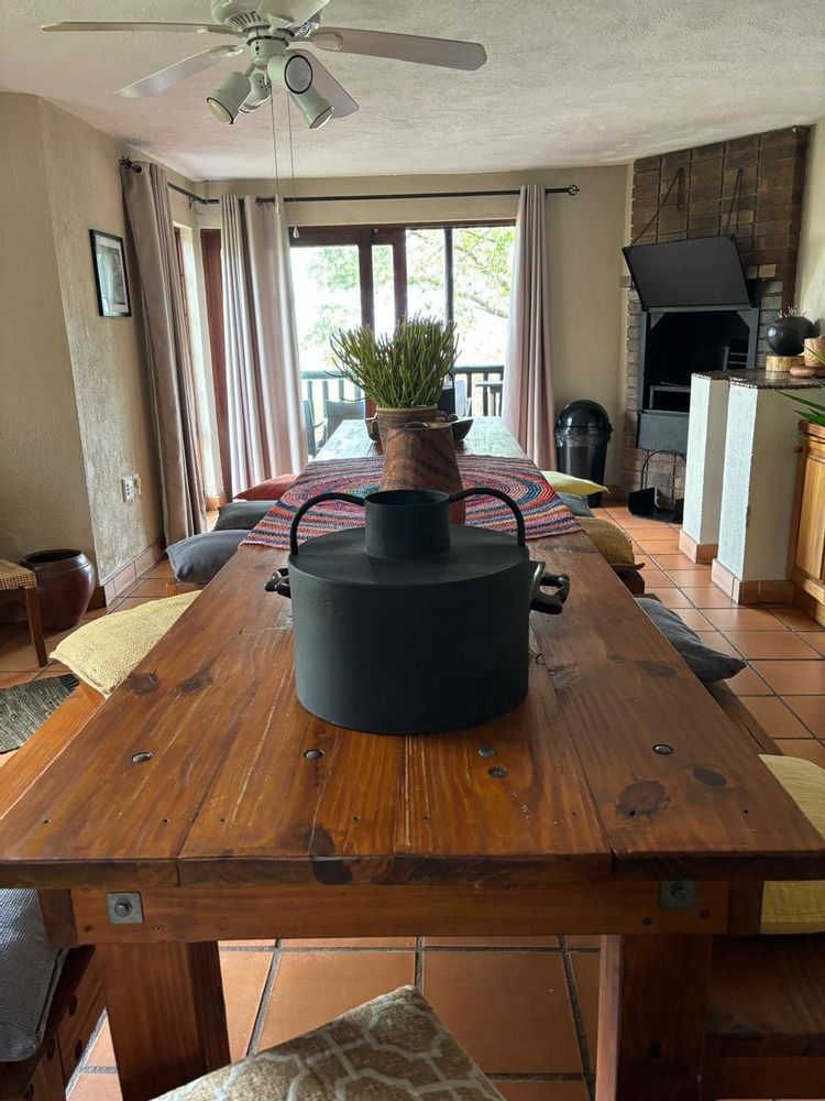 Lounge / Dining area downstairs with fire place