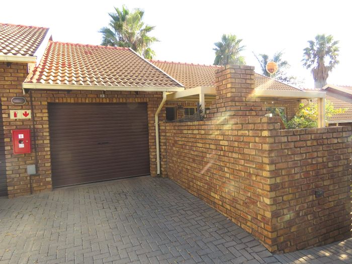 Highveld Townhouse For Sale: Ground floor unit, garden, garage, pet-friendly, secure complex.