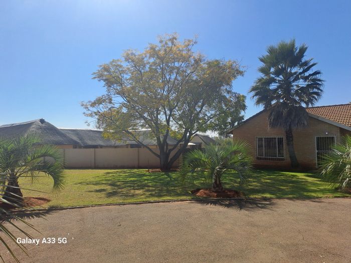 Spacious Bredell AH Small Holding with Home, Entertainment Area, and Income Potential!