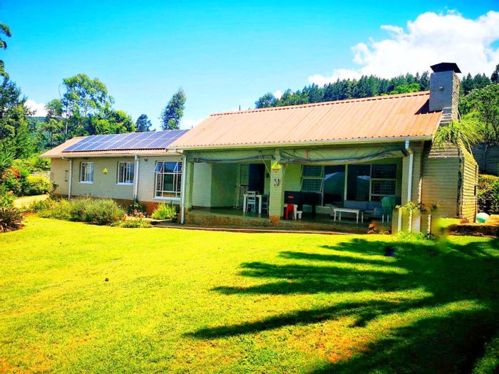 House for Sale in Sabie Central: 4 beds, cottage, solar panels, garden features.