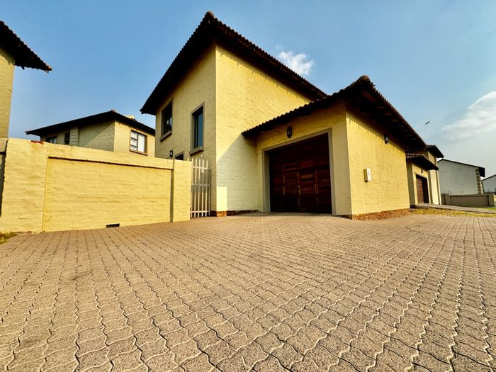 For Sale: House in Secunda Central with garden, braai area, and security features.